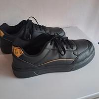 Scarpe da tennis color oro e nero, unisex