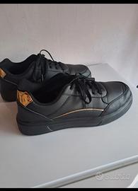 Scarpe da tennis color oro e nero, unisex