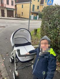 Carrozzina con seggiolino