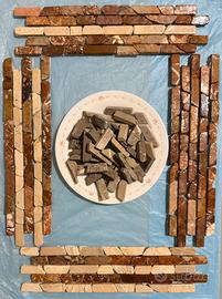 Ciottoli grigio chiaro, a due tagli, sfusi.