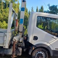 Autocarro camion Nissan Cabstar 35 ql con Gru