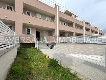 Ville a schiera con solarium