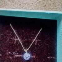  due collane  d'oro e orecchini con diamanti