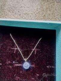  due collane  d'oro e orecchini con diamanti