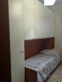 Camera ponte con letto e materasso