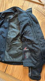 Giubbotto e guanti da moto