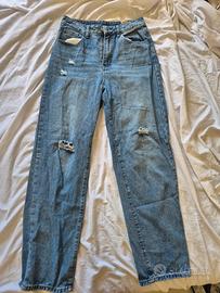 jeans baggy strappati