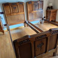 Letti antichi in legno intarsiato