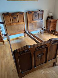 Letti antichi in legno intarsiato
