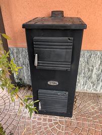 stufa a legna da interno sideros con i suoi tubi