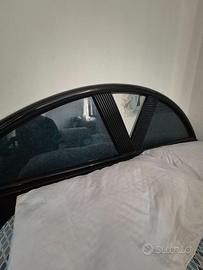 Letto con due comodini