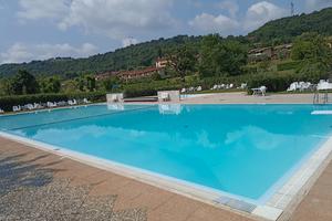 Bilocale vista lago in residence con piscina