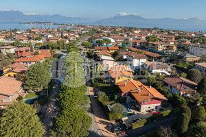 TRILOCALE INDIPENDENTE AL PIANO TERRA CON GIARDINO