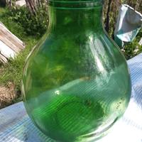 Damigiana antica in vetro di colore verde, a bocca