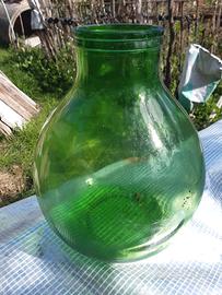 Damigiana antica in vetro di colore verde, a bocca