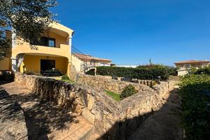 Appartamento trilocale al piano terra con giardino