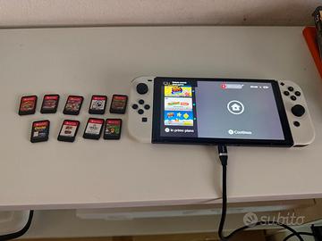 consolle portatile Nintendo switch OLED + 9 giochi