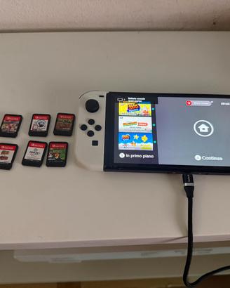 consolle portatile Nintendo switch OLED + 9 giochi