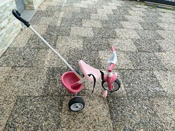 Triciclo a pedali rosa per bambini piccoli