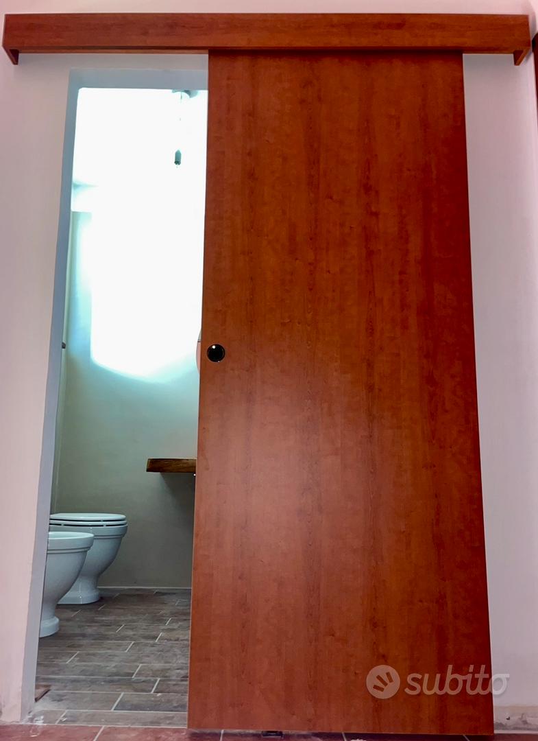 Porta scorrevole esterno muro in legno laminato. - Arredamento e