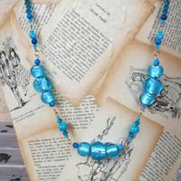 collana con perle in vetro soffiato di Murano