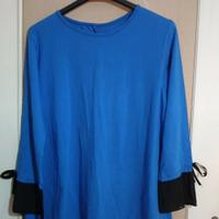 Maglia a maniche lunghe con voilant neri
