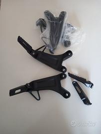 Speed triple 1050 pedane per scarico basso