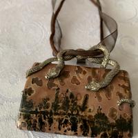 Ciondolo etnico pietra dura e serpente in argento