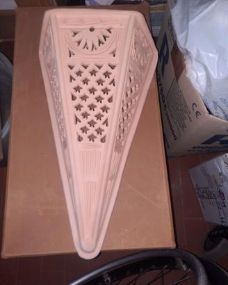 Applique in terracotta