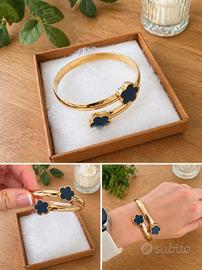 Bracciale rigido oro con quadrifogli neri stile 