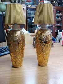 bottiglie vintage decori oro adattate a lampade 