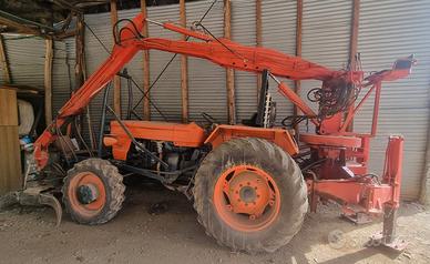 TRATTORE OM 650 CON BRACCIO FORESTALE SVA 5000