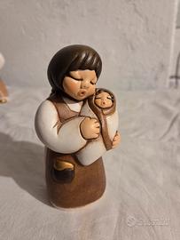 Mamma con neonato presepe giubileo thun