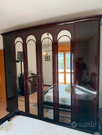 Camera da letto in legno laccato