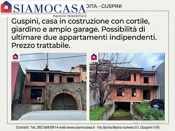 Casa in costruzione con box e giardino