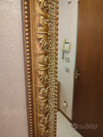 Cornice specchio in cornice dorata