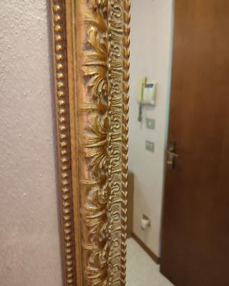 Cornice specchio in cornice dorata
