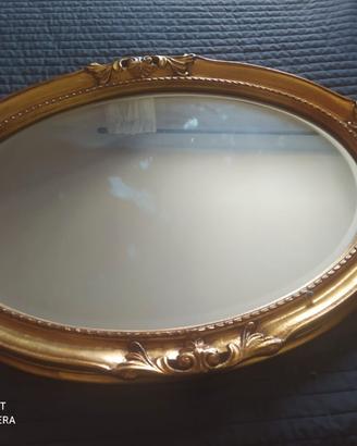 Specchio con cornice in legno placcata oro