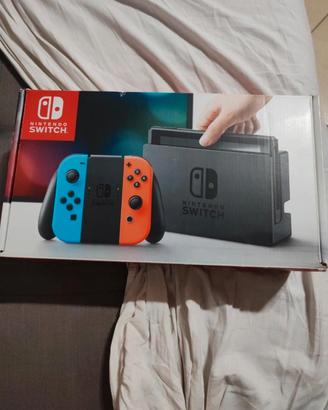 Nintendo switch,scatola, 7 giochi e gli accessori 