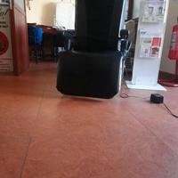 Poltrona massaggiante in pelle reclinabile