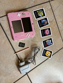 console nintendo 2ds rosa con caricabatterie