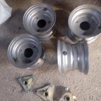 quad 4 cerchi ferro usati + tre mozzi