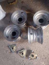 quad 4 cerchi ferro usati + tre mozzi
