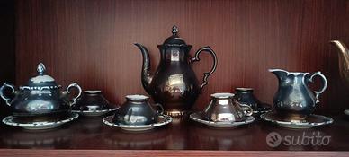 Servizio da te in argento e ceramica lavorata 