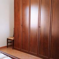 Camera da letto classica in legno massello