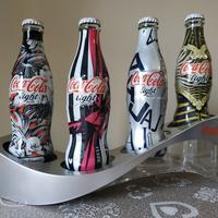 4 Bottiglie piene Coca Cola Light con Espositore