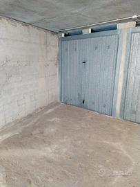 Box interrato,chiusura con basculante+cancello aut