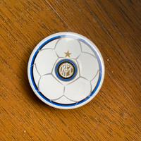 Inter - spilla