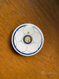 Inter - spilla