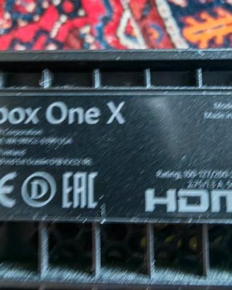 Xbox One X con 2 joypad e 9 giochi